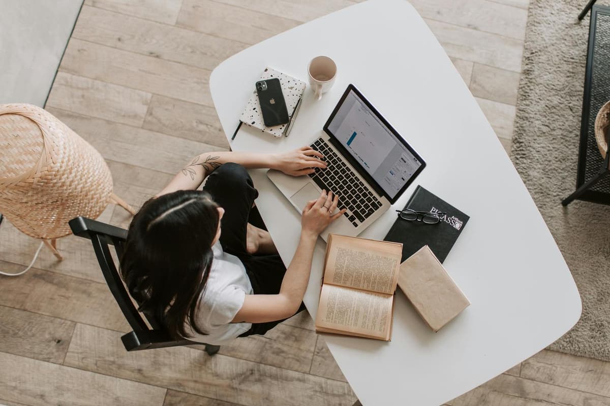 Woman booking appointment on laptop